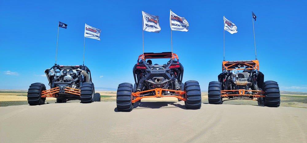 White Boosted LaRue Performance flag. Each flag will instantly add an additional 5 hp to your machine once installed! There are 2 grommets in each flag and they're significantly light so you don't have to worry about them slowing you down! 