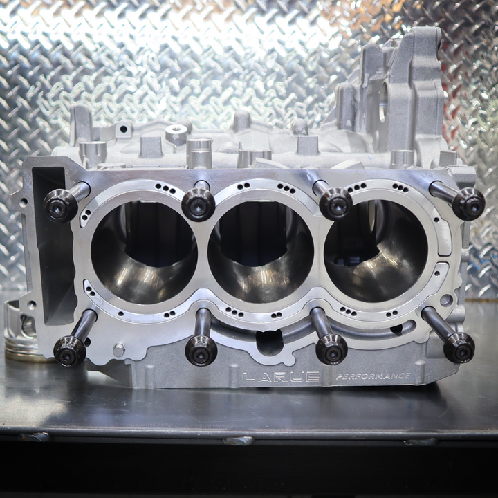 LaRue Performance Can-Am X3 2018 to 2021 aftermarket closed deck cylinder and bigger stud machine work. With increased boost and HP you increase the cylinder pressure. The factory block is a open deck and has no support at the top of the cylinder. Therefore it can expand and move around under the head gasket with no support, resulting in a blown head gasket. With increased boost and HP you increase the cylinder pressure.