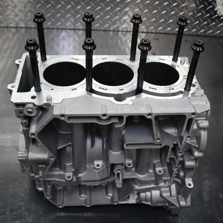 LaRue Performance Can-Am X3 2018 to 2021 aftermarket closed deck cylinder and bigger stud machine work. With increased boost and HP you increase the cylinder pressure. The factory block is a open deck and has no support at the top of the cylinder. Therefore it can expand and move around under the head gasket with no support, resulting in a blown head gasket. With increased boost and HP you increase the cylinder pressure.