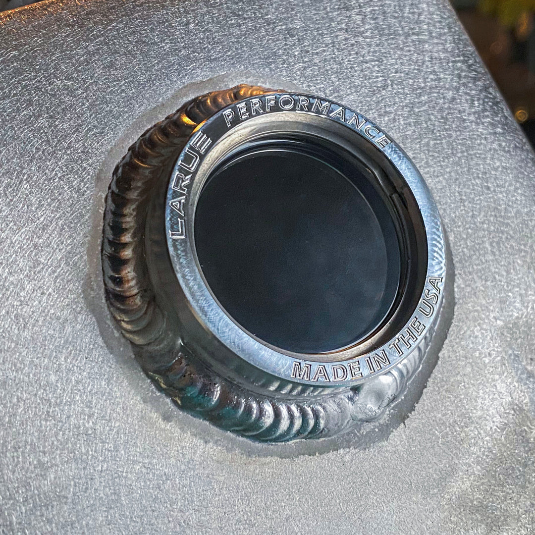 Replace your plastic Stock Coolant Tank with our durable Aluminum Coolant Tank. LaRue Performance's aftermarket Aluminum Coolant reservoir is well made with billet mounting brackets and a strong billet filler neck, making it reliable and eliminating all the weak points.