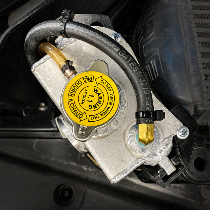 Replace your plastic Stock Coolant Tank with our durable Aluminum Coolant Tank. LaRue Performance's aftermarket Aluminum Coolant reservoir is well made with billet mounting brackets and a strong billet filler neck, making it reliable and eliminating all the weak points.